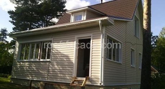 Облицовка виниловым сайдингом и отделка цоколя панелями (Токсово)