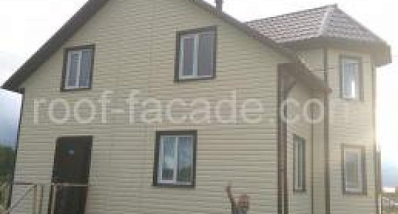 Отделка фасада сайдингом в Ириновке