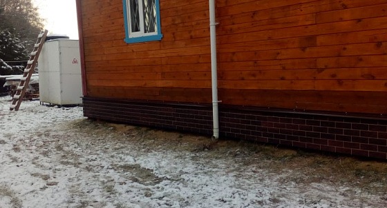 Облицовка цоколя панелями под кирпич в селе Шум 