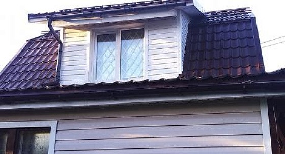 Монтаж металлочерепицы и облицовка сайдингом в Красном Селе