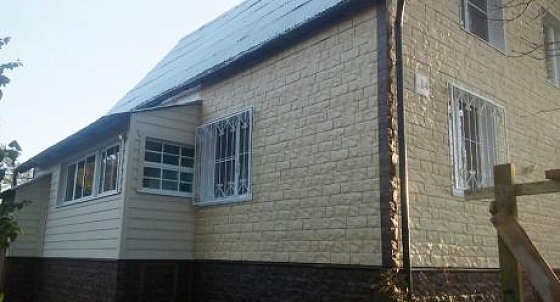 Облицовка дома фасадными панелями в Белоострове