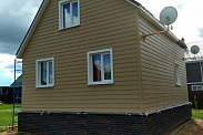Отделка фасада фиброцементным сайдингом Этернит Кедрал