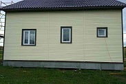 Отделка фасада сайдингом в Ириновке