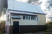 Облицовка дома фасадными панелями в Белоострове