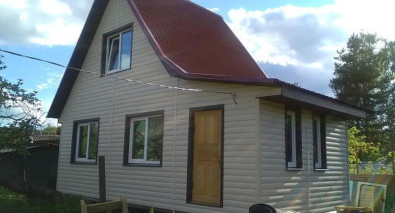 Облицовка фасада виниловым блок-хаусом, монтаж ондулина Кировск